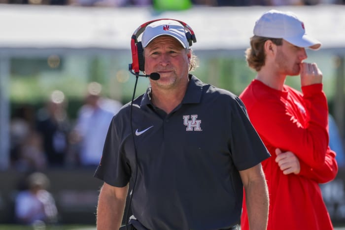 Nov 25, 2023; Orlando, Florida, USA; Houston Cougars head coach Dana Holgorsen walks the sideline during the second quarter against the UCF Knights at FBC Mortgage Stadium. Mandatory Credit: Mike Watters-USA TODAY Sports